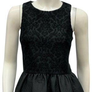 Tibi black peplum top with brocade detail